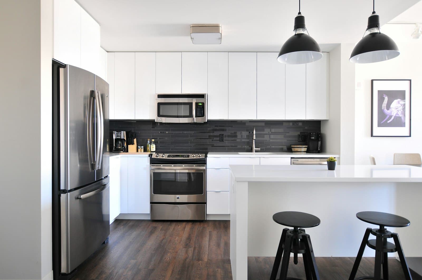 Remodelled white kitchen with island bench